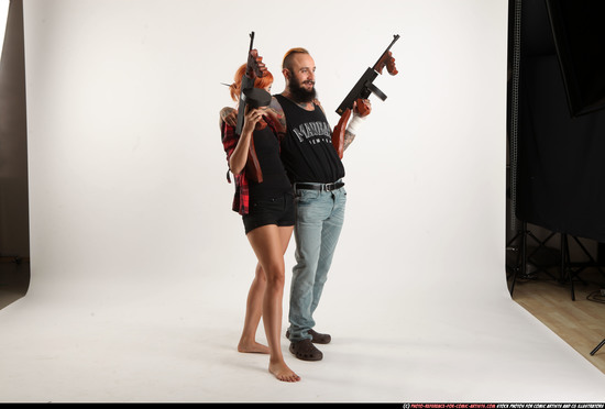 Man & Woman Adult Athletic White Fighting with submachine gun Standing poses Casual