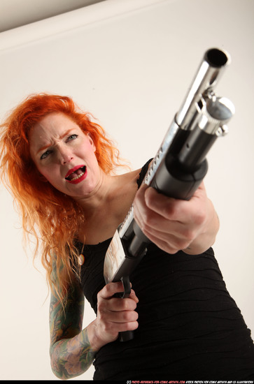 Woman Adult Athletic White Standing poses Casual Fighting with shotgun