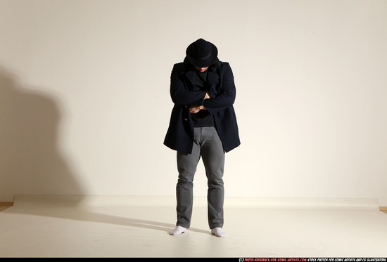 Man Adult Muscular White Fighting with gun Standing poses Coat