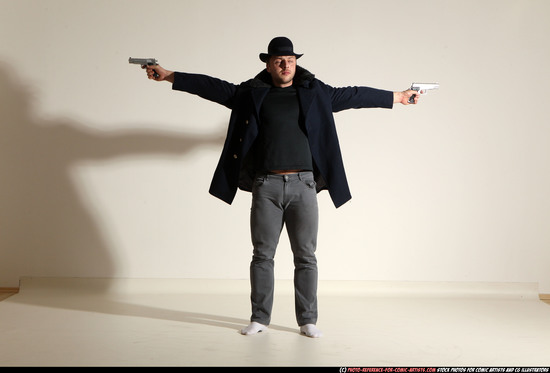 Man Adult Muscular White Fighting with gun Standing poses Coat