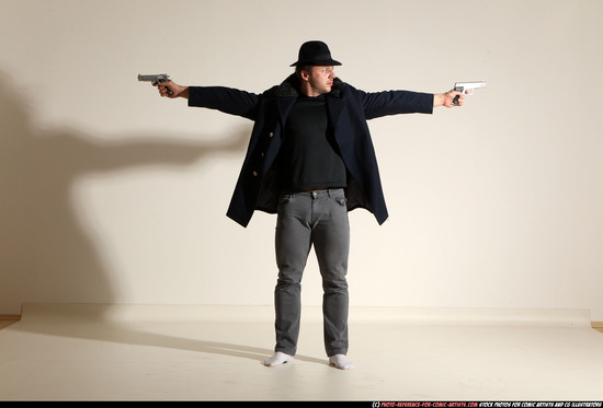 Man Adult Muscular White Fighting with gun Standing poses Coat