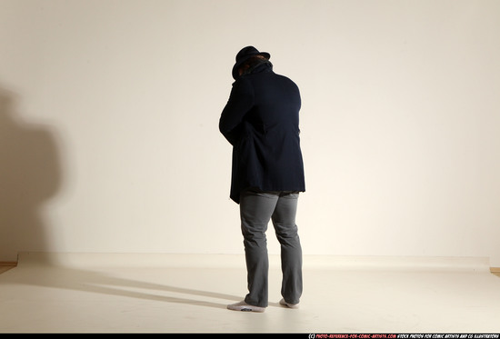 Man Adult Muscular White Fighting with gun Standing poses Coat