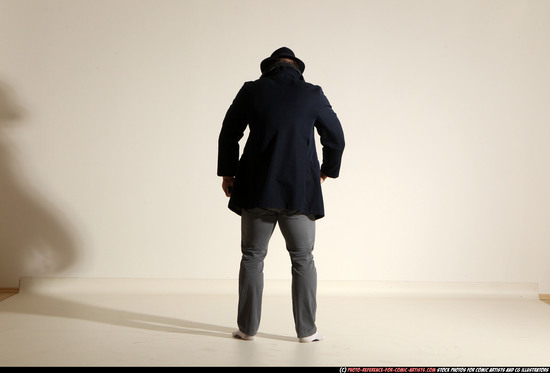 Man Adult Muscular White Fighting with gun Standing poses Coat