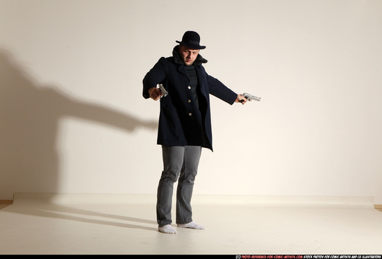 Man Adult Muscular White Fighting with gun Standing poses Coat