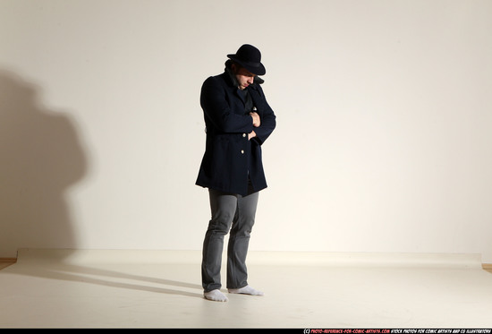 Man Adult Muscular White Fighting with gun Standing poses Coat