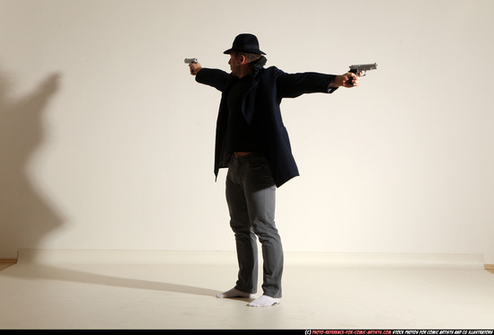 Man Adult Muscular White Fighting with gun Standing poses Coat