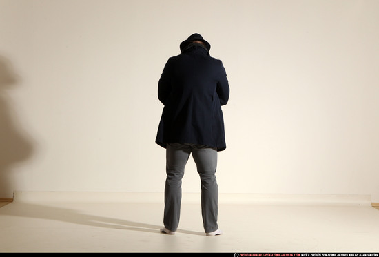 Man Adult Muscular White Fighting with gun Standing poses Coat