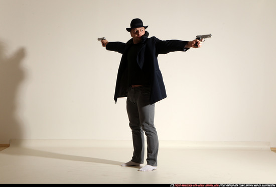 Man Adult Muscular White Fighting with gun Standing poses Coat