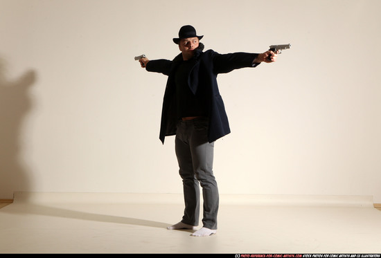 Man Adult Muscular White Fighting with gun Standing poses Coat