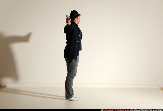 Man Adult Muscular White Fighting with gun Standing poses Coat