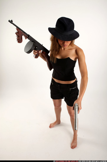 Woman Adult Athletic White Fighting with submachine gun Standing poses Casual