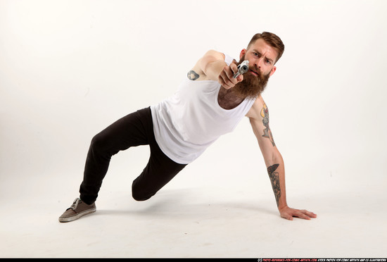 Man Adult Athletic White Fighting with gun Laying poses Casual