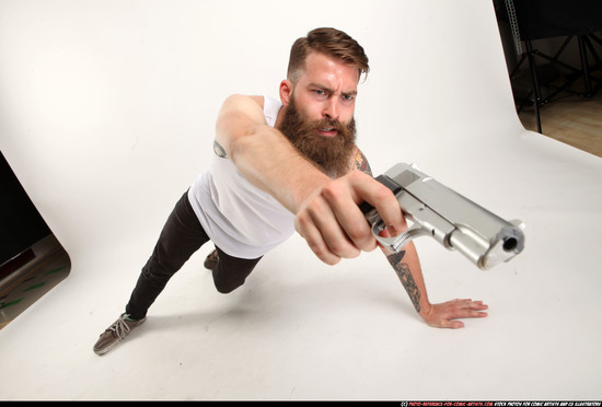 Man Adult Athletic White Fighting with gun Laying poses Casual