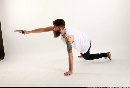 Man Adult Athletic White Fighting with gun Laying poses Casual