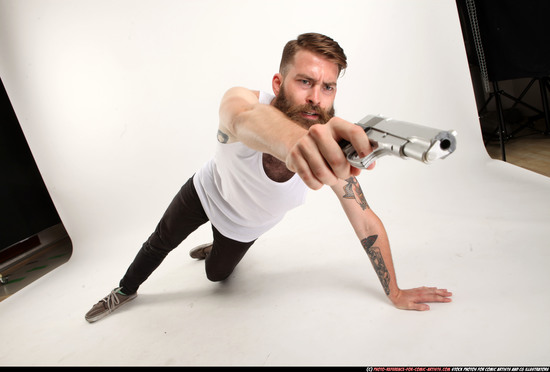 Man Adult Athletic White Fighting with gun Laying poses Casual