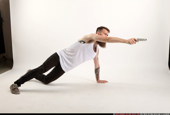 Man Adult Athletic White Fighting with gun Laying poses Casual