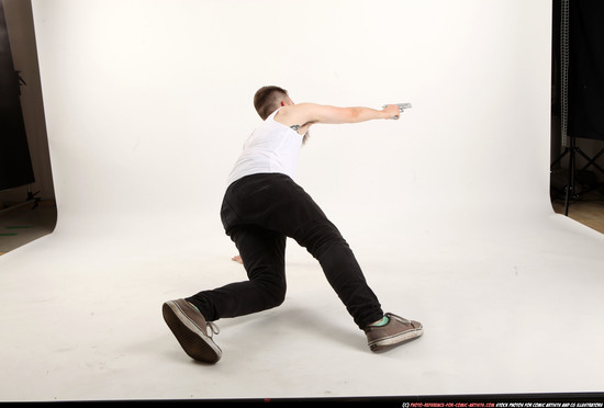 Man Adult Athletic White Fighting with gun Laying poses Casual