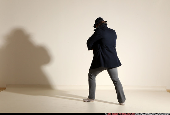 Man Adult Athletic White Fighting with gun Moving poses Coat