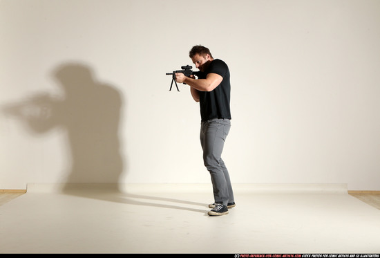 Man Adult Muscular White Fighting with submachine gun Moving poses Casual