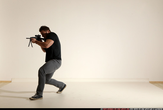 Man Adult Muscular White Fighting with submachine gun Moving poses Casual