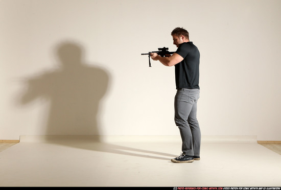 Man Adult Muscular White Fighting with submachine gun Moving poses Casual