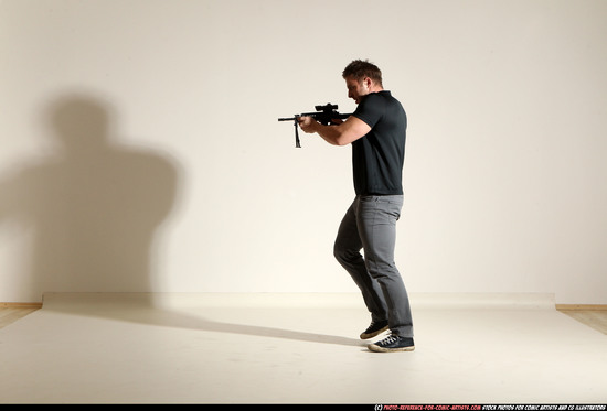 Man Adult Muscular White Fighting with submachine gun Moving poses Casual