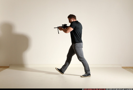 Man Adult Muscular White Fighting with submachine gun Moving poses Casual