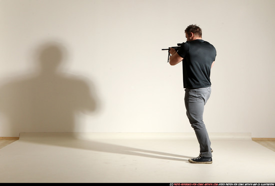 Man Adult Muscular White Fighting with submachine gun Moving poses Casual