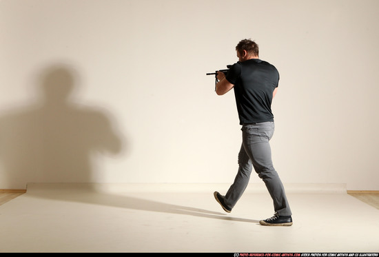 Man Adult Muscular White Fighting with submachine gun Moving poses Casual