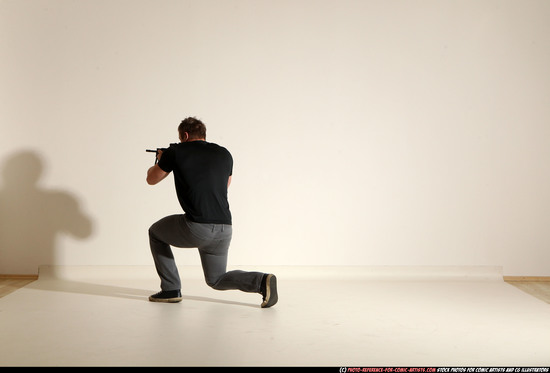 Man Adult Muscular White Fighting with submachine gun Moving poses Casual