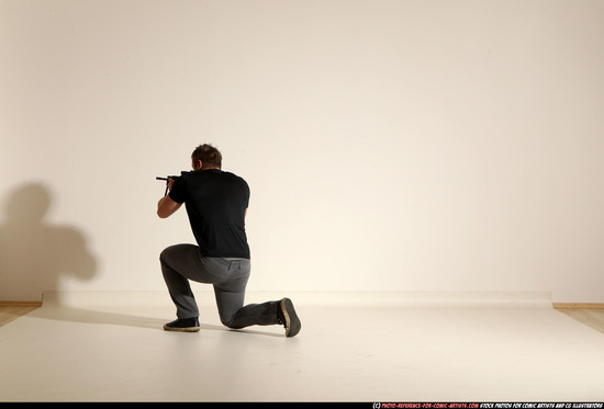 Man Adult Muscular White Fighting with submachine gun Moving poses Casual