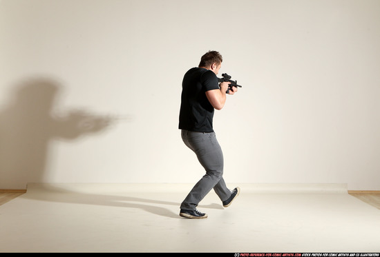 Man Adult Muscular White Fighting with submachine gun Moving poses Casual