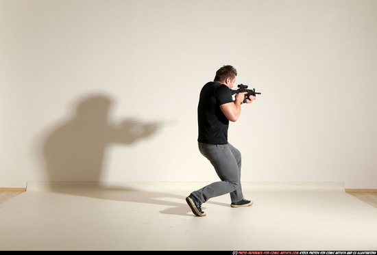 Man Adult Muscular White Fighting with submachine gun Moving poses Casual