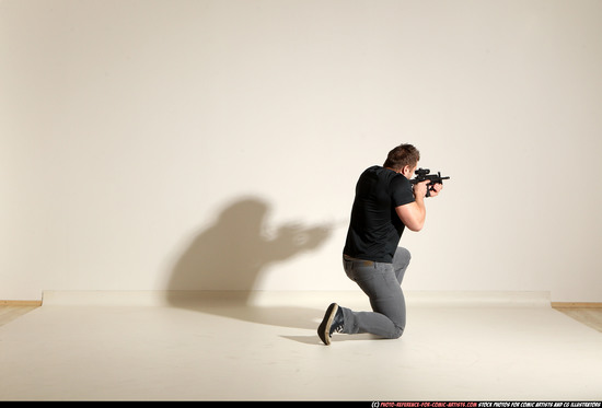 Man Adult Muscular White Fighting with submachine gun Moving poses Casual