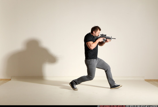 Man Adult Muscular White Fighting with submachine gun Moving poses Casual