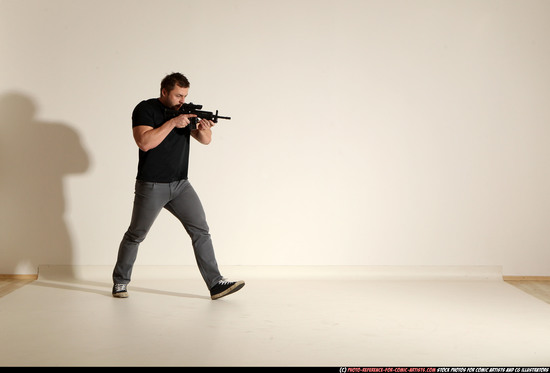 Man Adult Muscular White Fighting with submachine gun Moving poses Casual