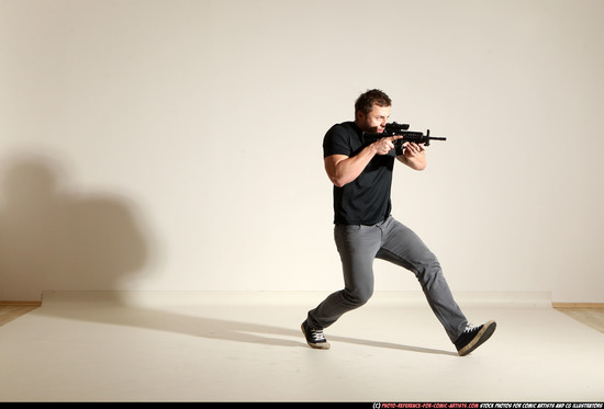 Man Adult Muscular White Fighting with submachine gun Moving poses Casual