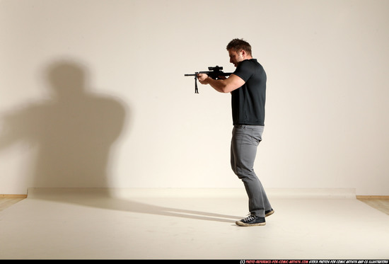 Man Adult Muscular White Fighting with submachine gun Moving poses Casual