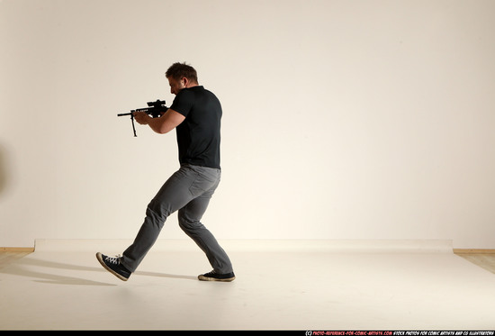 Man Adult Muscular White Fighting with submachine gun Moving poses Casual