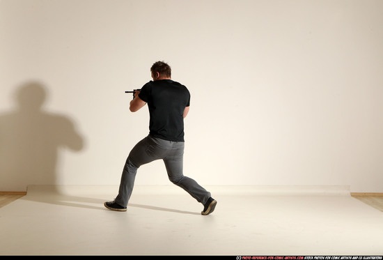 Man Adult Muscular White Fighting with submachine gun Moving poses Casual