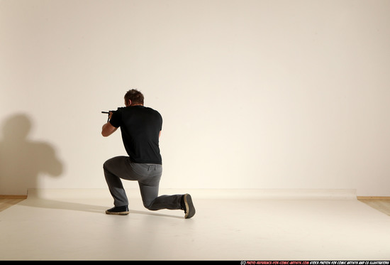 Man Adult Muscular White Fighting with submachine gun Moving poses Casual