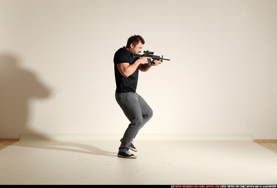 Man Adult Muscular White Fighting with submachine gun Moving poses Casual