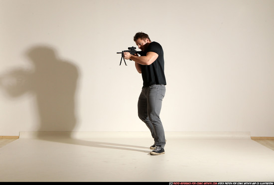 Man Adult Muscular White Fighting with submachine gun Moving poses Casual