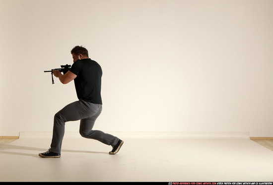 Man Adult Muscular White Fighting with submachine gun Moving poses Casual