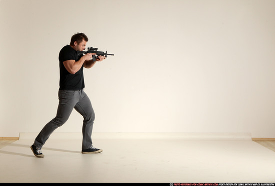 Man Adult Muscular White Fighting with submachine gun Moving poses Casual