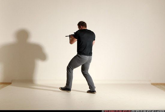 Man Adult Muscular White Fighting with submachine gun Moving poses Casual