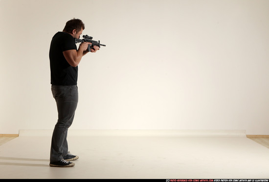 Man Adult Muscular White Fighting with submachine gun Moving poses Casual