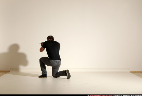 Man Adult Muscular White Fighting with submachine gun Moving poses Casual