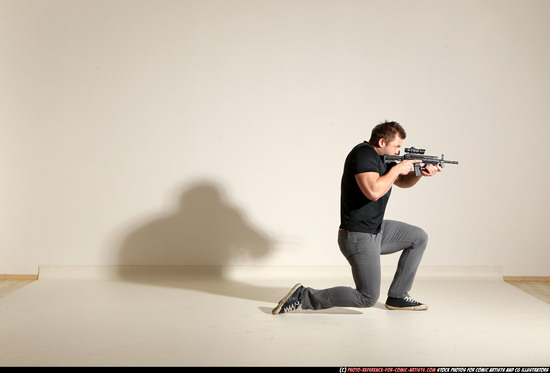 Man Adult Muscular White Fighting with submachine gun Moving poses Casual