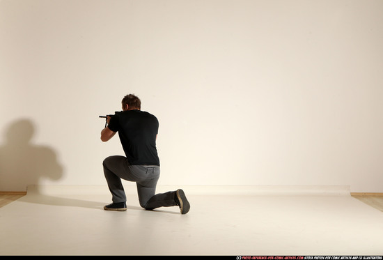 Man Adult Muscular White Fighting with submachine gun Moving poses Casual